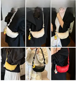 Fashionable crescent shoulder bag with knotted strap and cute duck charm in four colors