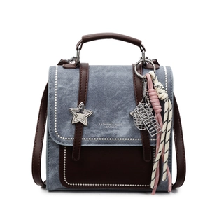 Sac à dos carré en jean et cuir marron pour femme avec détails d'étoiles en métal