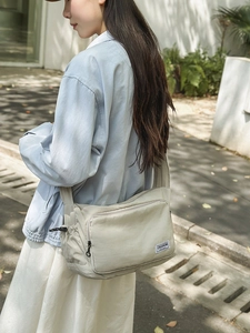 Fashionable beige waterproof nylon dumpling shoulder bag with large capacity and logo