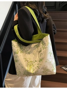 Large capacity tote bag with green bamboo leaf print and bright green shoulder straps