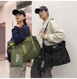 Detail of durable nylon tote bags in green and black with logo pouches and straps