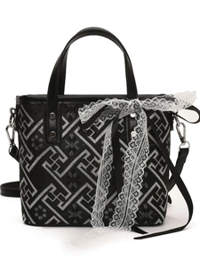 Modern New Chinese style black bucket bag with white geometric print and lace bow
