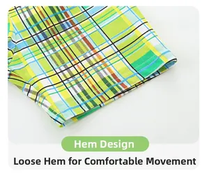 Détail de l'ourlet du short à carreaux colorés avec coutures de qualité et tissu respirant