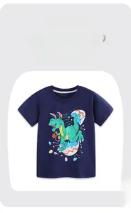 Close-up of boys' navy blue cotton t-shirt featuring a cute dinosaur egg cartoon print