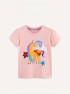 Close-up of pink cotton T-shirt featuring a colorful unicorn and rainbow print with puff sleeves