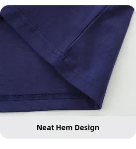 Detail of dark blue cotton t-shirt hem featuring neat double-needle stitching and finish