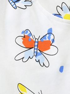 White cotton girls' shorts with butterfly and flower prints, soft breathable fabric