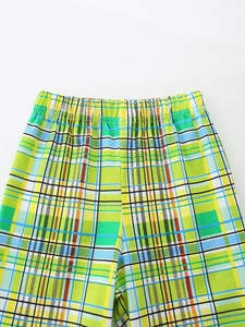 Shorts à carreaux pour enfants avec base vert vif, motif quadrillé et taille élastique