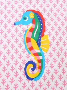 Girls summer two-piece outfit featuring a colorful seahorse print with vibrant patterns