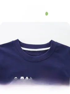 Close-up of ribbed round neck on kids' navy blue cotton t-shirt with geometric print