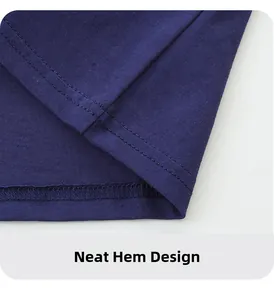 Detail of the navy blue cotton shirt hem showing precise double-needle stitching