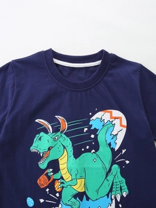 Boys navy cotton t-shirt featuring a green cartoon Easter dinosaur with bunny ears print