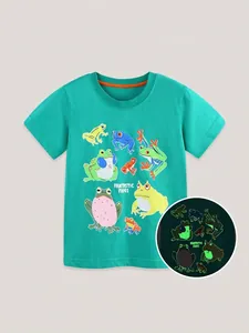 Green kids glow-in-the-dark t-shirt with cartoon frog prints and orange crew neck detail