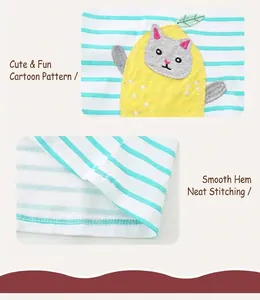 Detail of girls striped dress featuring cute cartoon cat embroidery and clean hem stitching