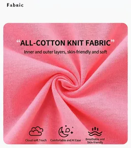 Close-up of soft pink 100% cotton knit fabric showing breathable texture and weave