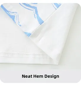 Detail of the double-needle flat seam hem and blue print on white cotton boy's t-shirt