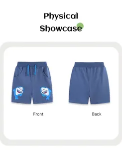 Detail view of boy's cotton shorts showing front and back with shark embroidery