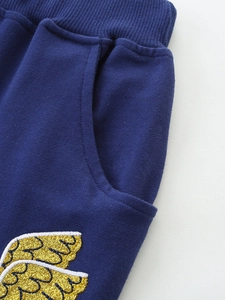 Girls navy blue cotton shorts featuring ribbed elastic waist and gold sequin wing embroidery