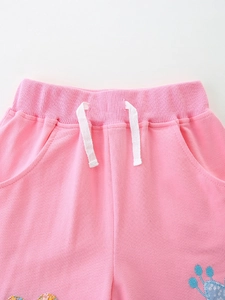 Pink cotton girls sports shorts with elastic drawstring waist and colorful embroidery detail