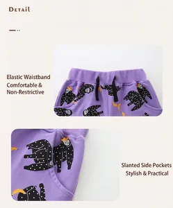 Detail of purple cotton shorts featuring elastic drawstring waist and side pockets