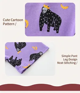 Detail of purple knitted fabric with gorilla print and neat stitching at the hem