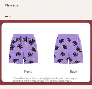 Front and back view of purple girls' shorts with gorilla and banana cartoon prints