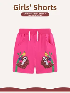 Detail of rose red girls' cotton shorts featuring sloth embroidery and white drawstring