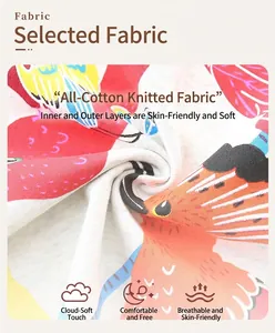 Close-up of soft pure cotton knitted fabric with colorful cartoon bird print for girls
