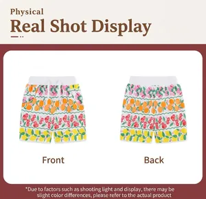 Detailed front and back view of girls' cotton shorts with vibrant fruit patterns