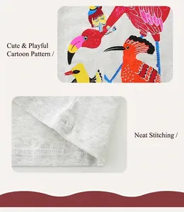 Detailed view of the double-needle stitching and colorful flamingo print on cotton t-shirt