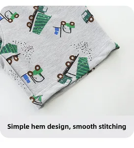 Detailed view of kids knit cotton shorts with cartoon vehicle prints and smooth stitching