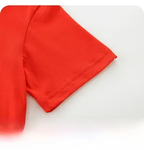 Close-up of red cotton t-shirt sleeve with high-quality double-needle flat stitching detail