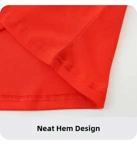 Detail view of double-stitched hem on red cotton t-shirt with flat and neat seams