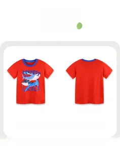 Detail of red kids shark t-shirt with blue ribbed neck and shark print on white background