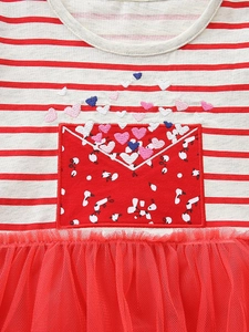 Striped red and white girl's dress with a tulle skirt and heart embroidery accents