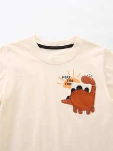 Kids' beige cotton short sleeve t-shirt with cute dinosaur pocket and Here For Fun print