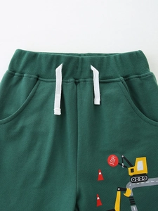 Boys' green cotton joggers with elastic drawstring waist and excavator print