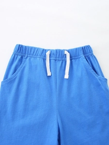 Casual bright blue cotton knit shorts for boys with elastic drawstring waist and pockets