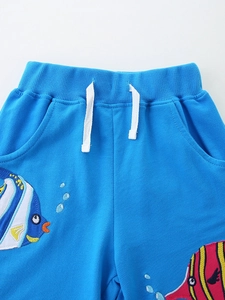 Kids royal blue knit sports shorts with tropical fish embroidery and elastic drawstring waist