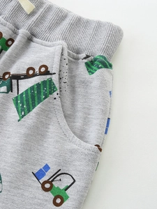Boys grey knit cotton shorts with colorful construction truck prints and drawstring
