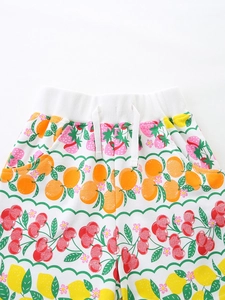 Girls' summer cotton shorts featuring colorful all-over fruit prints and elastic drawstring