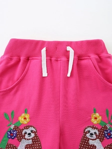 Pink cotton shorts for girls with detailed sloth and flower embroidery and elastic waist