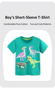 Detail of bright green cotton t-shirt with colorful dinosaur prints for boys