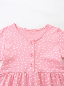 Robe d'été rose en coton pour filles avec pois blancs et boutons au col rond élégant