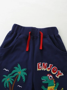 Dark blue knit cotton boys shorts with embroidered cartoon dinosaur and red drawstring