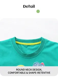 Detail of green kids T-shirt with round neck and fluorescent yellow inner lining