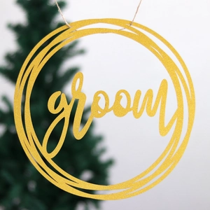 Golden groom chair banner with glitter finish for wedding decoration on green tree background