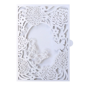 Laser-cut white floral invitation cover featuring butterfly designs and secure closure