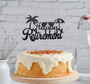 Scene showing Happy Retirement cake topper with glitter finish and beach elements