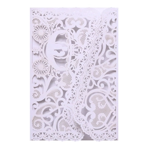 Elegant white laser-cut wedding invitation featuring a romantic royal carriage design
